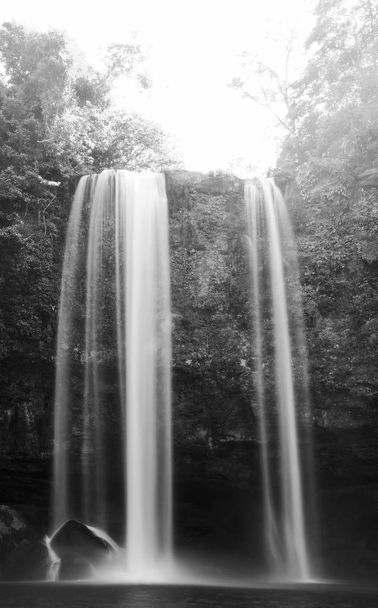 Sunrise on Misol Ha waterfall near Palenque in Chiapas, Mexico in black and white - Photo, Image