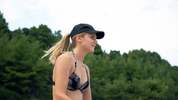 Young teen girl playing beach tennis - Valokuva, kuva
