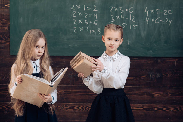 modern school. modern girls in school. modern school concept. modern education of pupils. together since school. - Фото, изображение