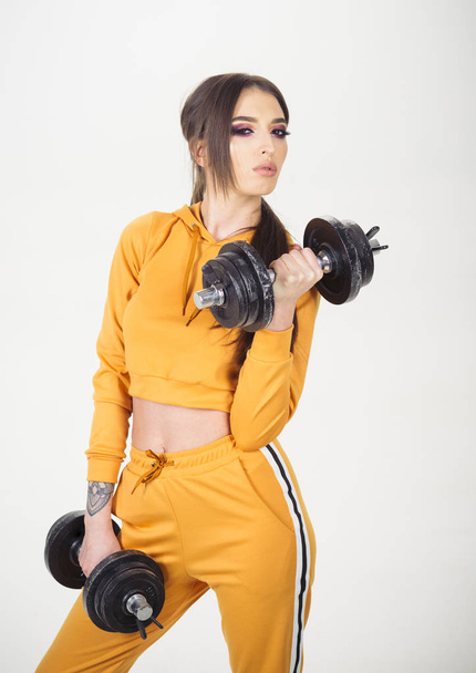 healthy lifestyle. healthy lifestyle of sporty woman with dumbbell. healthy lifestyle concept. woman training and loves her healthy lifestyle. full of energy. - Fotoğraf, Görsel