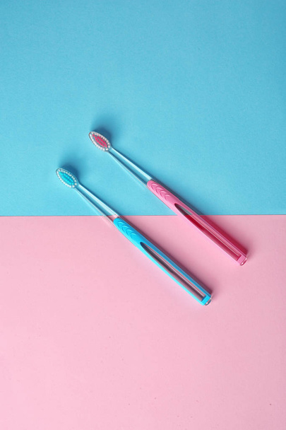 Manual toothbrushes on color background. Dental care - Φωτογραφία, εικόνα