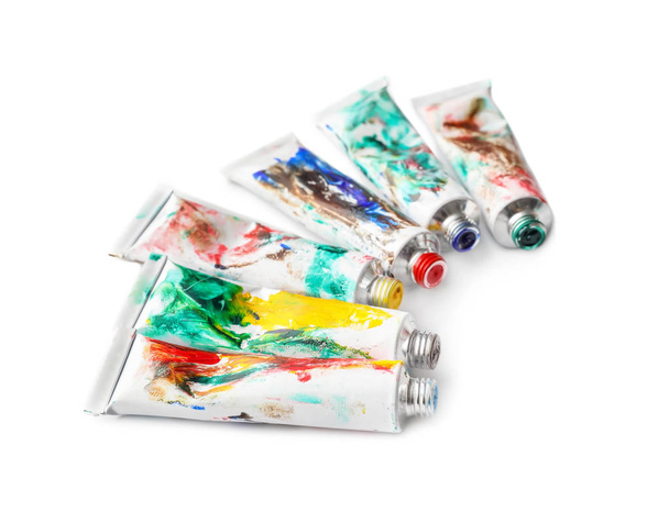 Tubos com tintas a cores sobre fundo branco
 - Foto, Imagem