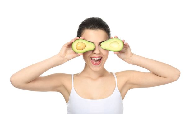 Funny young woman with avocado on white background - Fotografie, Obrázek