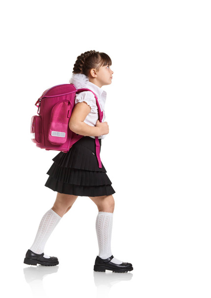 Schoolgirl with bag full length - Foto, Imagen