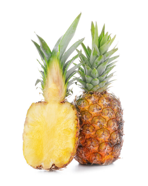 Delicious pineapples on white background - Photo, Image