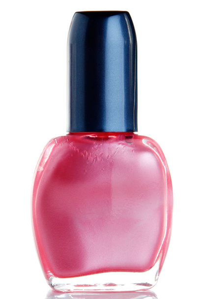 roze nagellak fles geïsoleerd op wit - Foto, afbeelding