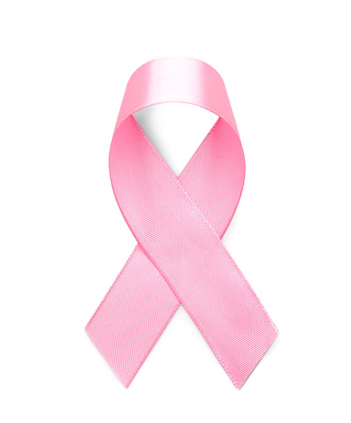 白い背景にピンクのリボン。乳がんの概念 - 写真・画像