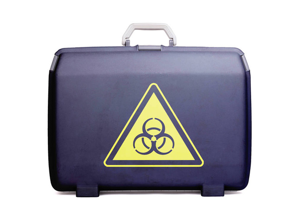 Used plastic suitcase with stains and scratches, printed with sign, danger, biohazard - Photo, Image