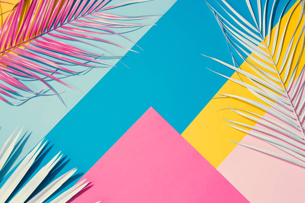 Tropical bright colorful background with exotic painted tropical palm leaves, Minimal fashion summer concept - Photo, Image