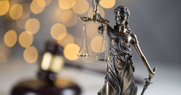 Lady Justice on golden bokeh background - Photo, Image