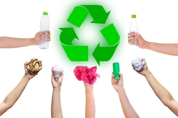 Recyclable hand hold show symbol plastic bottle used paper canned light bulb a white background - Photo, Image