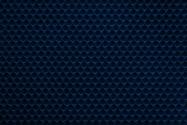 рівномірна гофрована текстура синтетичної тканини або текстильного матеріалу темно-синього кольору і крупним планом для фону
 - Фото, зображення