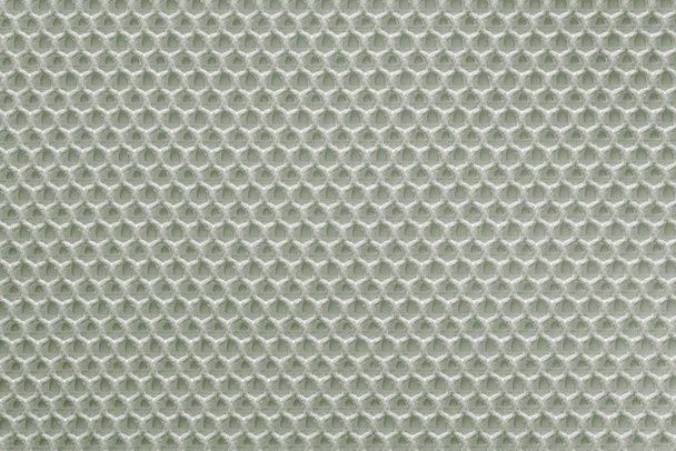 рівномірна гофрована текстура синтетичної тканини або текстильного матеріалу блідо-зеленого кольору і крупним планом для фону
 - Фото, зображення