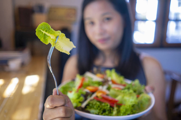 Salad in a white plate - Foto, imagen