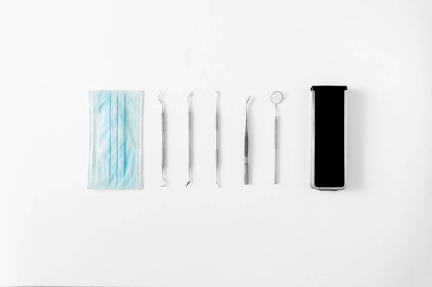 Orthodontics dental instruments. Flat lay on white background. - Photo, Image