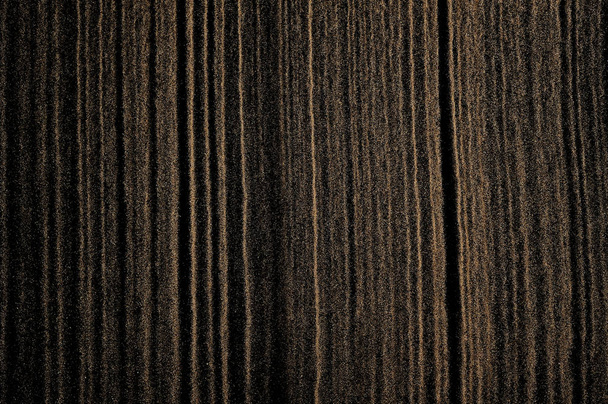 Sandy wave isolated on black background. Abstract sand dune. - Fotoğraf, Görsel