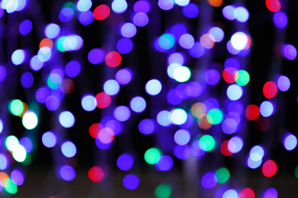 Christmas glowing lights, blurred view - Φωτογραφία, εικόνα