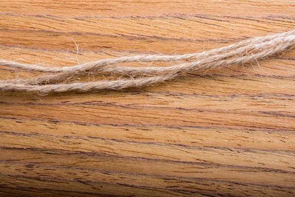 Коричневий вісоном струни на дерев'яні текстури - Фото, зображення