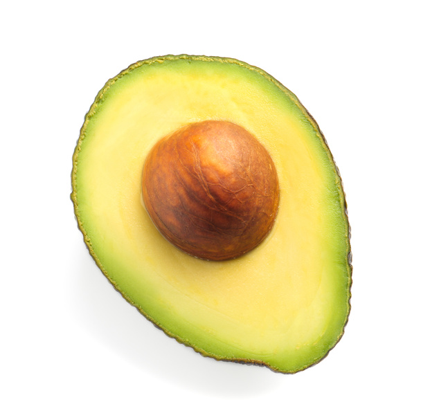 Половина свежего авокадо на белом фоне
 - Фото, изображение