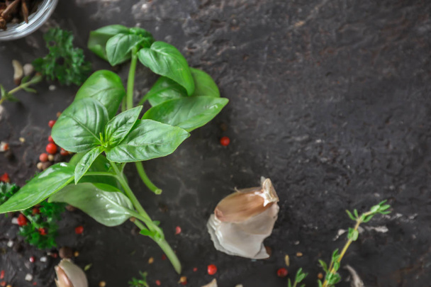 Fresh basil with spices on grey background - Fotoğraf, Görsel