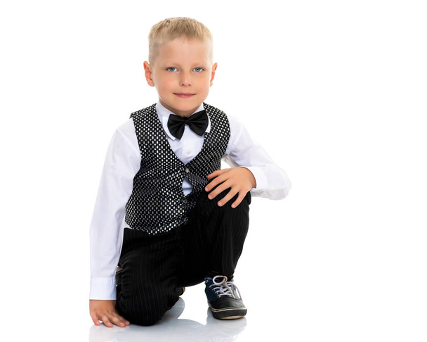 A little boy in a waistcoat with a butterfly. - Photo, Image