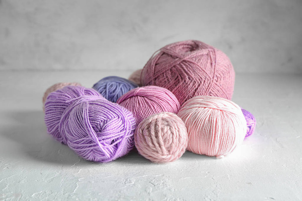 Different knitting yarn on light background - Photo, Image