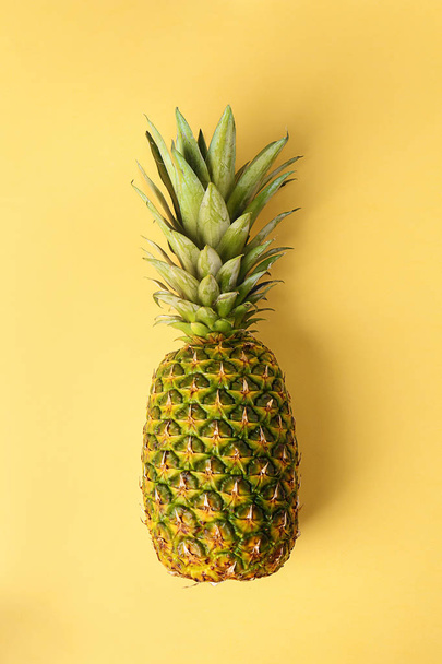Delicious pineapple on color background - Фото, изображение