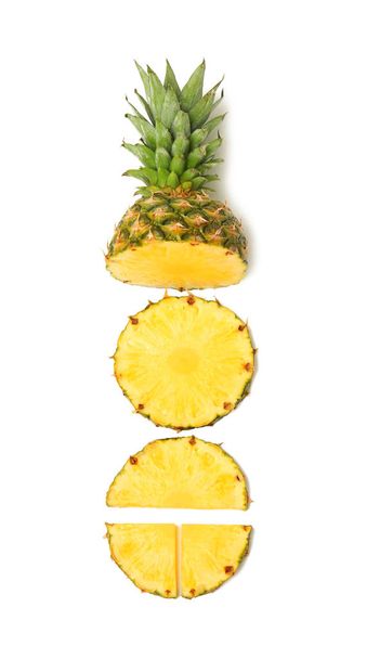 Cut ripe pineapple on white background - Photo, Image