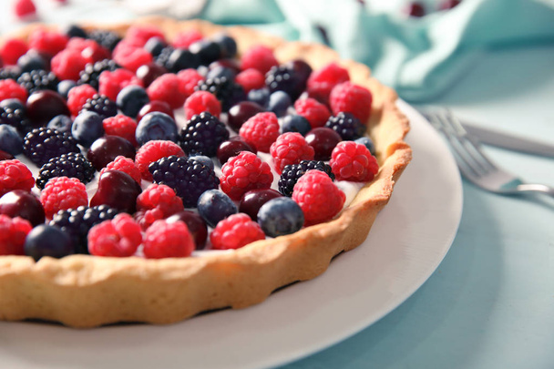 Plate with delicious berry pie on table, closeup - Photo, Image