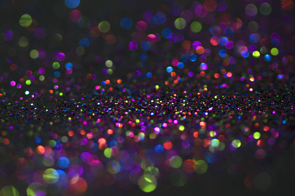Bokeh glitter fly and lights on black background - Fotografie, Obrázek