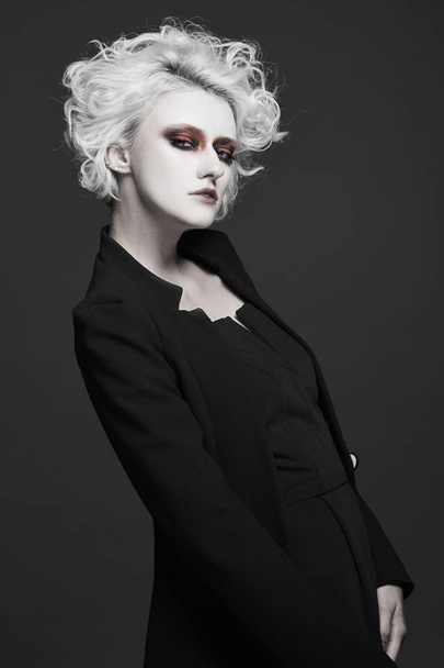 fashion young woman with white skin and hair with clown make-up.freaky halloween make-up style girl - Φωτογραφία, εικόνα