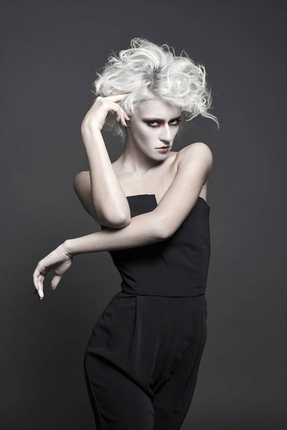 fashion young woman with white skin and hair with clown make-up.freaky halloween make-up style girl - Zdjęcie, obraz