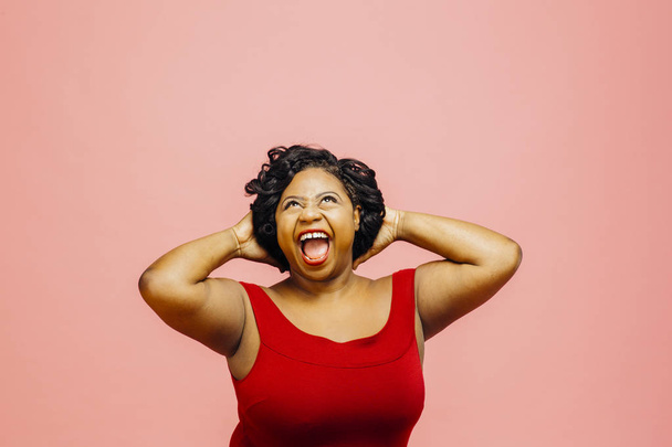 Pure joy Portrait of a happy screaming woman with big smile - Photo, Image