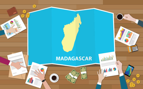 Madagaskar Afrika ekonomiky země růst národa týmu diskutovat s skládání mapy pohled z horní vektorové ilustrace - Vektor, obrázek