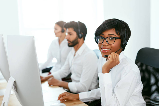Call Center Operator With Colleagues At Workplace. Woman Serving Customers On Hotline. High Resolution - Foto, Imagem