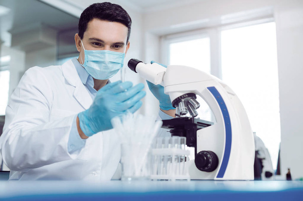 Professional male scientist working in the laboratory - Photo, image