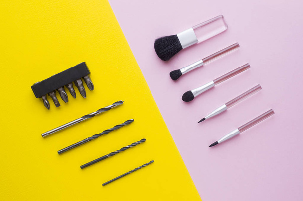 Makeup brushes on pastel pink background and drill bits on yellow background - Photo, image