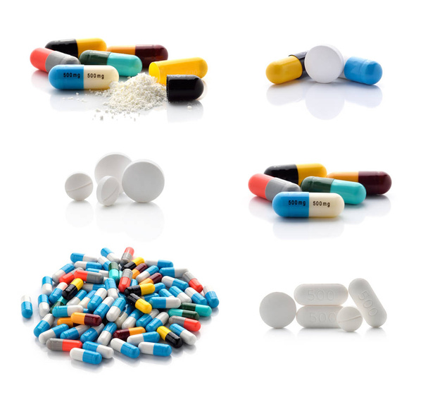 pillen en capsules geïsoleerd op witte achtergrond - Foto, afbeelding