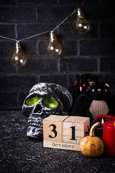  Halloween background with skull and candles  - Photo, Image