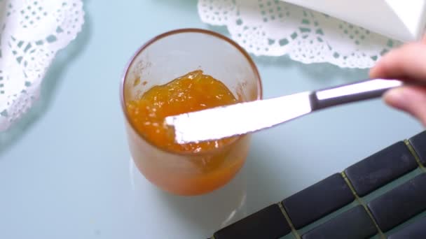 spreading tasty jam on the biscuit slice. Healthy breakfast - Footage, Video