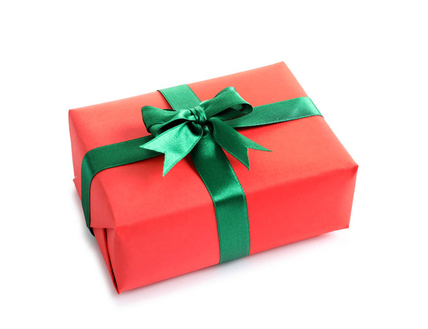 Beautifully wrapped gift box on white background - Фото, изображение