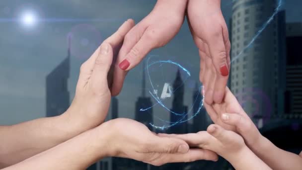 Mens, womens and childrens hands show a hologram Lean - Footage, Video