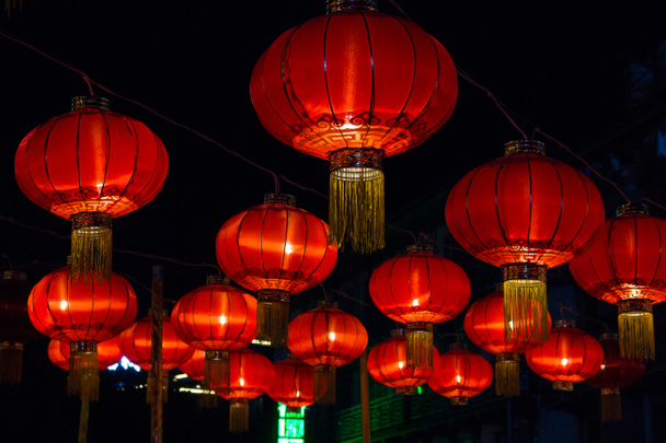 Traditional Red Chinese Paper Lanterns against a dark background - Fotoğraf, Görsel