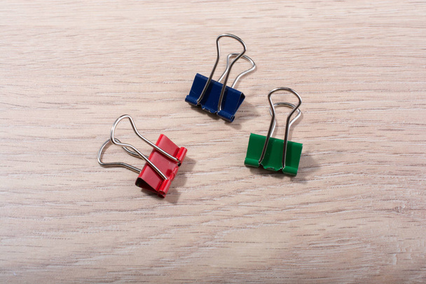 Picture of metallic binder clips with handles in view - Photo, Image