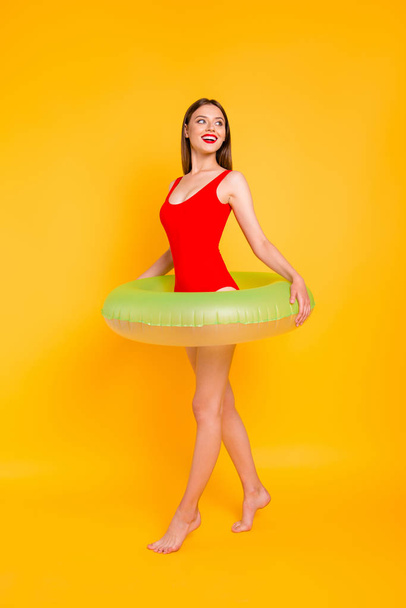 Travel tourism tourist resort lifestyle leisure dream dreamy people person concept. Vertical full length size body photo portrait of lovely girl with green lifebuoy isolated bright background - Zdjęcie, obraz