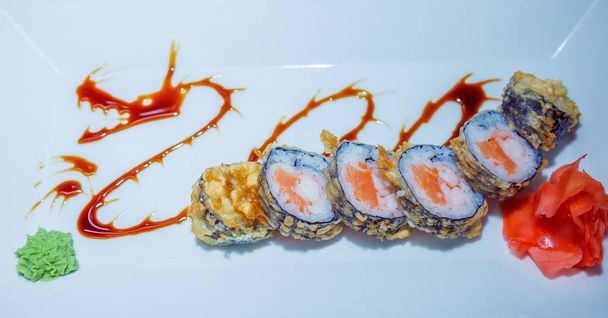 sushi rolls on white plate. food - Foto, Imagen