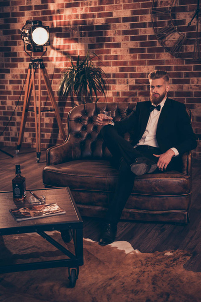 Leisure lifestyle smoke smoker ashtray bar restaurant boss chief weekend concept. Vertical full-size full-length photo of serious thinking masculine wealthy arrogant handsome guy drinking alcohol - Foto, Imagem