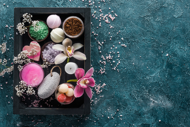 top view of sea salt, beautiful flowers and body care accessories in box - Fotografie, Obrázek