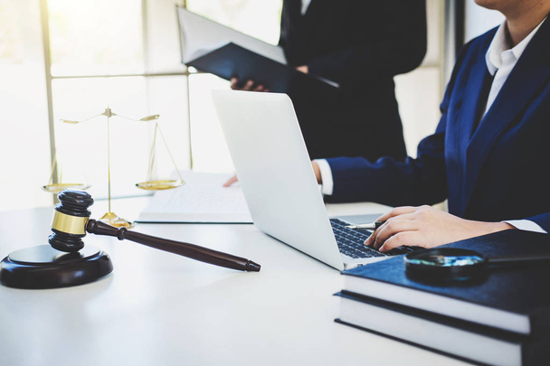 Teamwork of business lawyer colleagues, consultation and conference of professional female lawyers working having at law firm in office. Concepts of law, Judge gavel with scales of justice. - Foto, Imagen