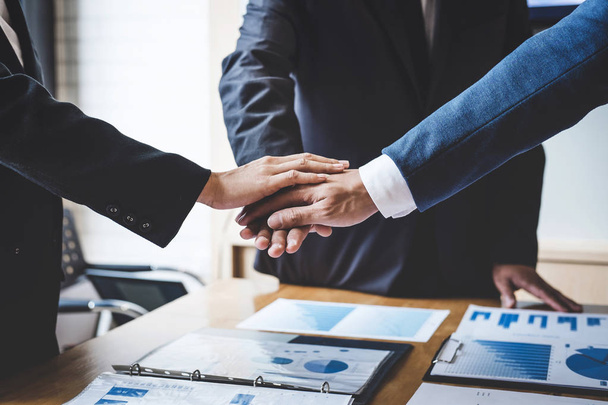Image of business people joining and putting hands together during their meeting, connection and collaboration concept, Teamwork process of partner and best relationship. - Foto, Imagem